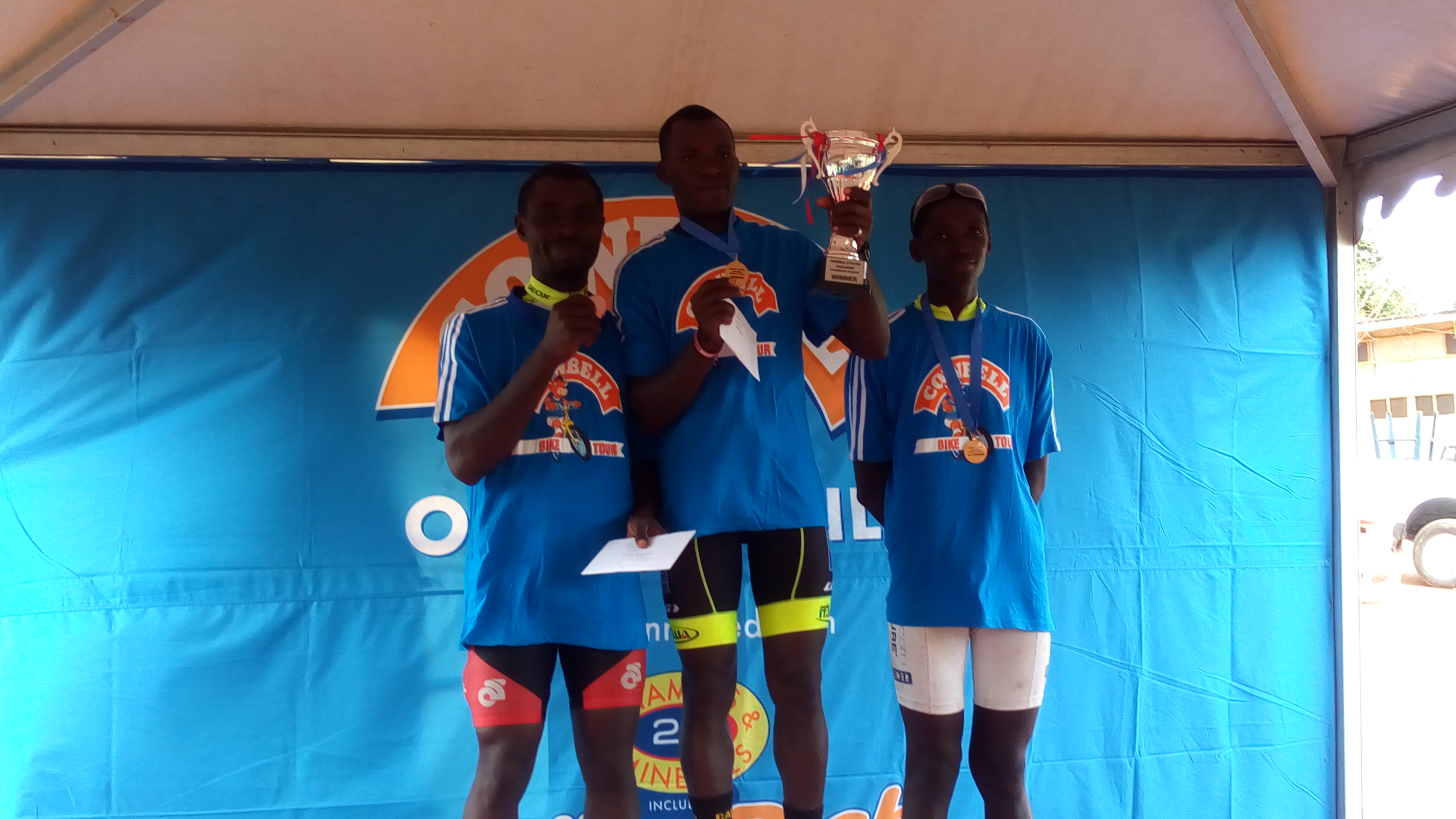Isaac Sackey poses with his trophy, he is flanked by Michael Agbugblah (left) and Solomon Tagoe. Isaac Sackey poses with his trophy, he is flanked by Michael Agbugblah (left) and Solomon Tagoe.