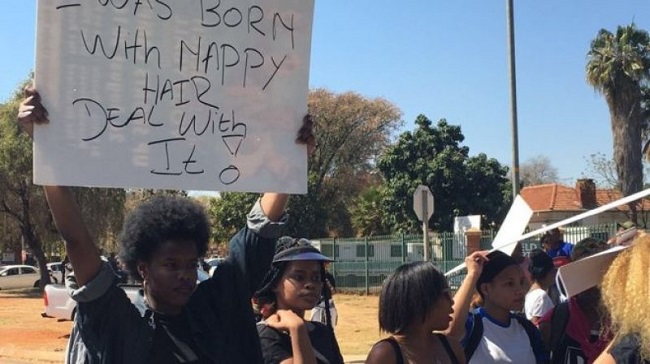 Protesters of all ages have been gathering outside the school gates this morning in solidarity Protesters of all ages have been gathering outside the school gates this morning in solidarity