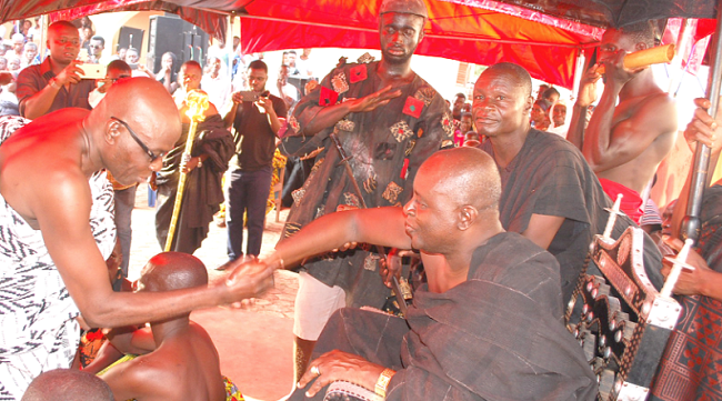 Barima Aframfo (left) being congratulated by the Omanhene of Japekrom, Okatakyie Aturu Nkonkonkyia George Adjei-Henneh installed Atipimhene of Japekrom