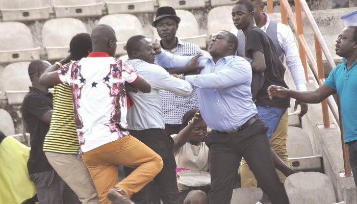 Angry Kotoko fans in scuffle with one of the reporters. Picture EMMANUEL BAAH Angry Kotoko fans in scuffle with one of the reporters. Picture EMMANUEL BAAH