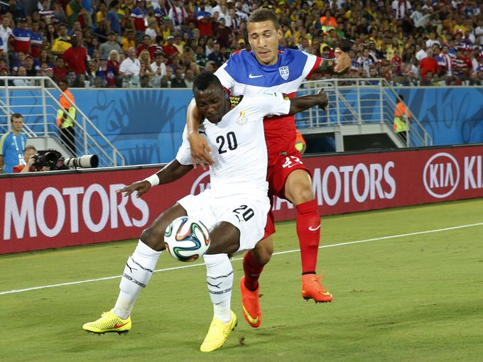 Kwadwo Asamoah holds off his US marker during the 2014 World Cup in Brazil Kwadwo Asamoah holds off his US marker during the 2014 World Cup in Brazil