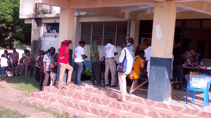 Some of the voters in a queue Some of the voters in a queue