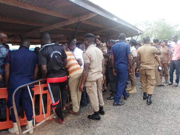 Special Voters as the Brong Ahafo Regional Police Headquarters Polling Centre jostling to find their names on the list. Special Voters as the Brong Ahafo Regional Police Headquarters Polling Centre jostling to find their names on the list.