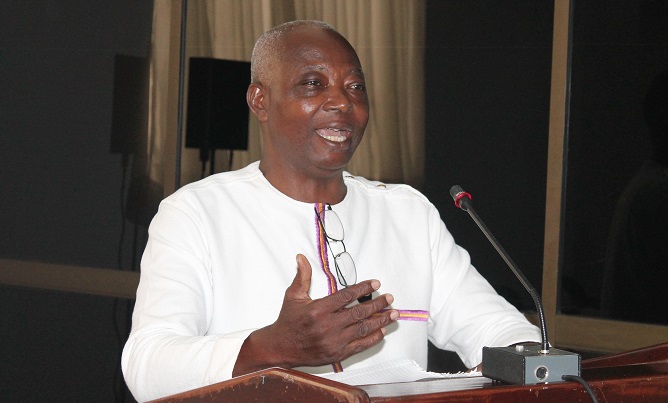Group Captain (retd) Stephen Komla  addressing a section of the participants in the conference. Picture: MAXWELL OCLOO