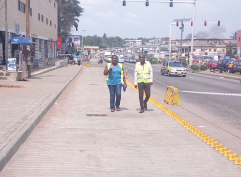 Some representatives of the Department of Urban Roads (DUR) and engineers inspecting the BRT bus lanes after the hand-over ceremony