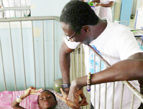KSM with one of the kids KSM with one of the kids