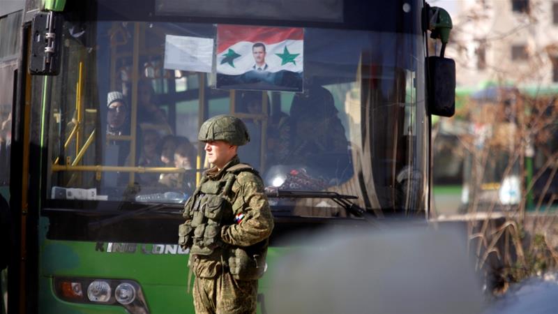 Syria suspends Aleppo evacuations, blaming rebels
