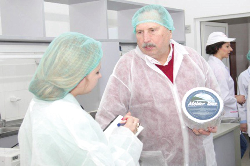 Bankrupt company pays debts, salaries with cheese