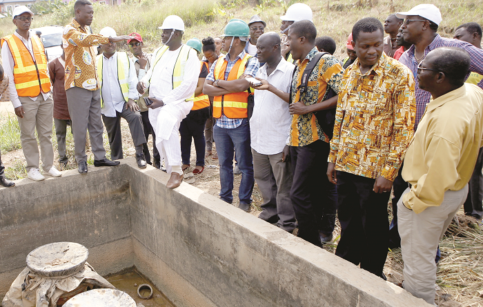 Dr Benjamin Vas Nyamadi (2nd left) showing the pipes to Mr Bukar Tijani (4th left), when he and his team paid a working visit to the Weija irrigation rehabilitation site at Weija. Picture: EMMANUEL ASAMOAH ADDAI Dr Benjamin Vas Nyamadi (2nd left) showing the pipes to Mr Bukar Tijani (4th left), when he and his team paid a working visit to the Weija irrigation rehabilitation site at Weija. Picture: EMMANUEL ASAMOAH ADDAI
