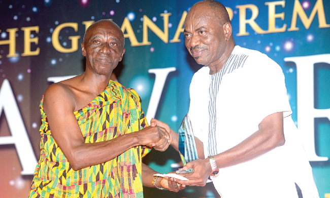 Mr George Amoako (right) vice-chairman of the PLB presenting the CEO of the Season to Mr Samuel Oduro-Nyarko, CEO of Wa All Stars At the 2016 PLB Awards