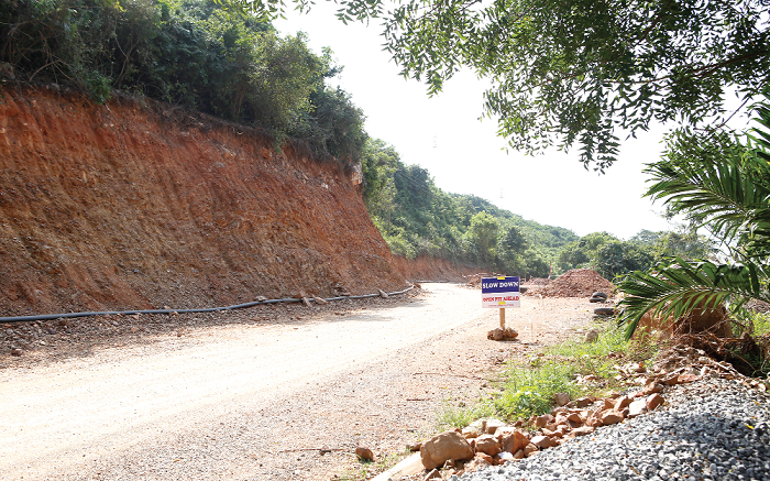 A section of the caved-in portion of the road being worked on. A section of the caved-in portion of the road being worked on.