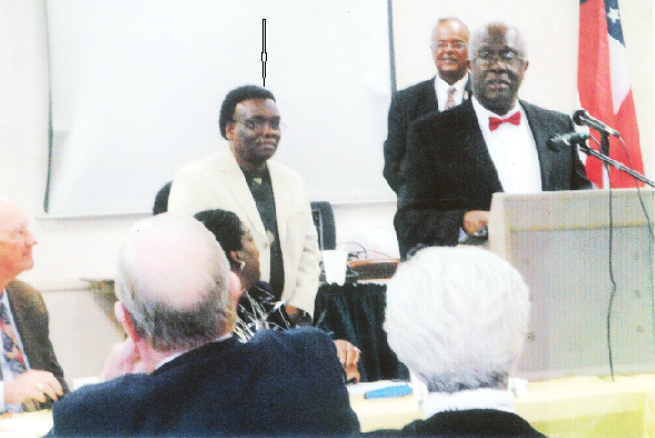 The President of the NAACP paying tribute to Dr George Cleland (arrowed) at the ceremony in Georgia The President of the NAACP paying tribute to Dr George Cleland (arrowed) at the ceremony in Georgia