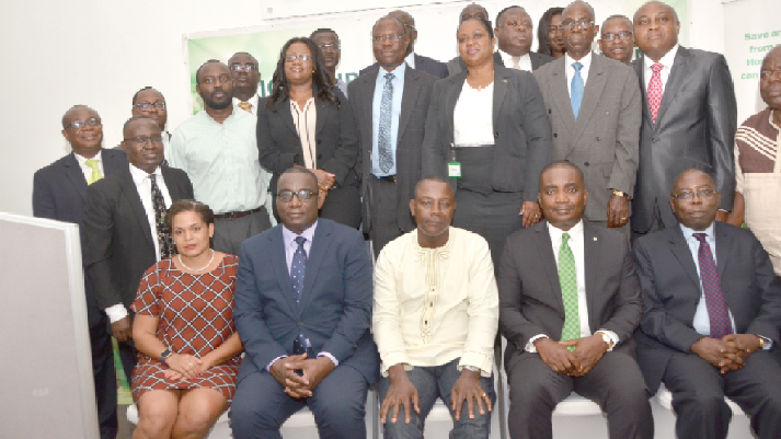 Mr Daniel Asiedu (seated 2nd right) and Mr K.S. Yamoah (right) with stakeholders of the bank Mr Daniel Asiedu (seated 2nd right) and Mr K.S. Yamoah (right) with stakeholders of the bank