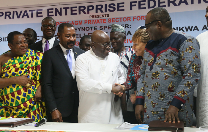  Nana Akufo-Addo (middle), the President-elect, interacting with some members of the federation after the AGM in Accra.  Picture: SAMUEL TEI ADANO
