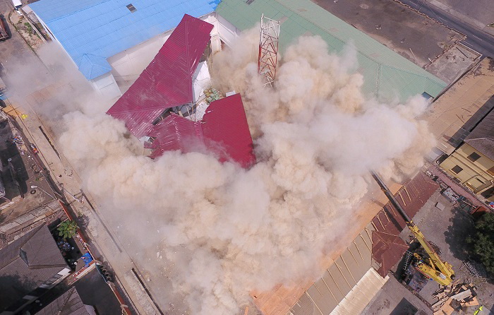The four-storey building caving in. Pictures: DOUGLAS ANANE-FRIMPONG