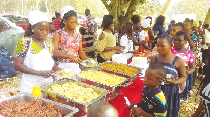 Orphans and vulnerable children being served at a party organised for them by an NGO, Building Lives Foundation, in Sunyani during Christmas Orphans and vulnerable children being served at a party organised for them by an NGO, Building Lives Foundation, in Sunyani during Christmas