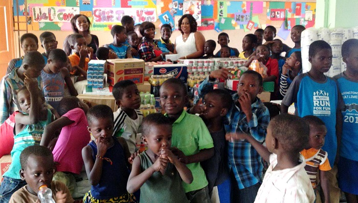 Mrs Ruth Rubabatu Agbesi, the CEO, Rubatch Enterprise, presenting the items to Ms Mariam Sagoe, Assistant Administrator of the Save Them Young Orphanage. Looking on are some of the inmates of the orphanage. Mrs Ruth Rubabatu Agbesi, the CEO, Rubatch Enterprise, presenting the items to Ms Mariam Sagoe, Assistant Administrator of the Save Them Young Orphanage. Looking on are some of the inmates of the orphanage.