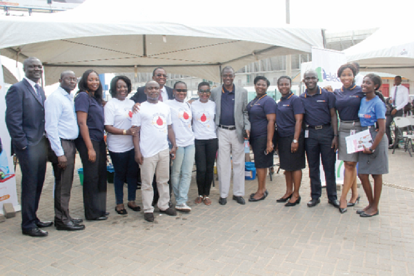 Staff of Access Bank, and members of Rotary Club in a pose with officials of the Korle Bu Blood Bank after the blood donation exercise Staff of Access Bank, and members of Rotary Club in a pose with officials of the Korle Bu Blood Bank after the blood donation exercise