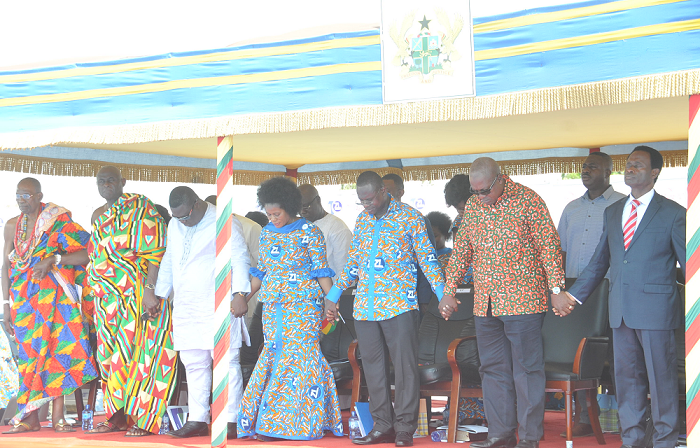 President Mahama (2nd right) joins hands with Dr Siaw Agyepong to pray for the nation and the company at the ceremony. President Mahama (2nd right) joins hands with Dr Siaw Agyepong to pray for the nation and the company at the ceremony.