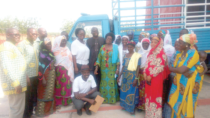  some members of the group and officials of Ghana EXIM Bank, after the presentation. Picture: Samuel Duodu