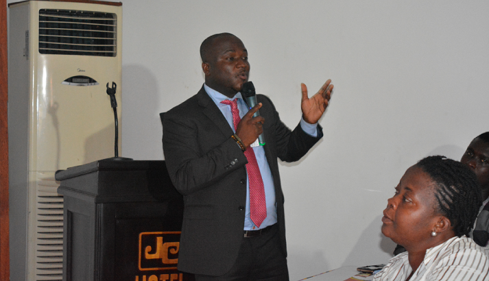  Mr Opoku (inset) speaking to business men and women at the event. 