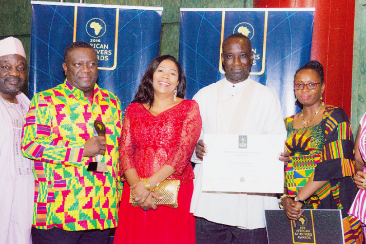 Mr Sylvanus Tamaklo (2nd from left), his wife Aisha and Ghana’s Permanent Representative to the ECOWAS, Mr William Awinador-Kanyinge, after receiving the award on behalf of Mrs Lordina Mahama. Mr Sylvanus Tamaklo (2nd from left), his wife Aisha and Ghana’s Permanent Representative to the ECOWAS, Mr William Awinador-Kanyinge, after receiving the award on behalf of Mrs Lordina Mahama.
