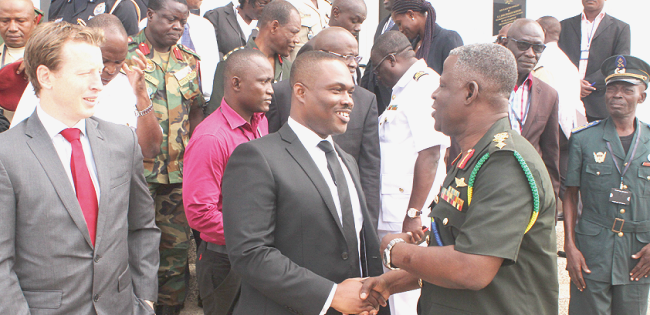Mr Gavin Cook (left), the Deputy British High Commissioner, looking on as Maj Gen Obed Akwa (right), outgoing Commandant - KAIPTC, exchanges pleasantries with Mr Kenneth Adjei, the Deputy Minister of Defence. Picture: NII MARTEY M. BOTCHWAY Vigilante groups not consistent with democracy — Gavin Cook