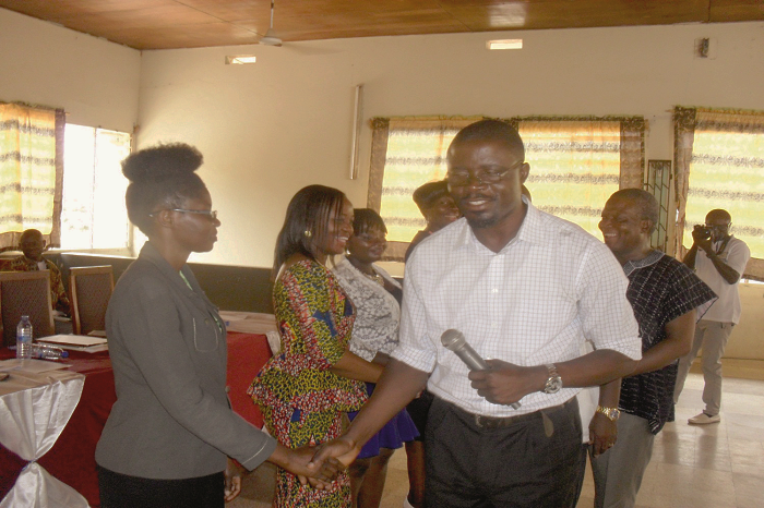 The acting Principal of MOMACOE, Mr Samuel Agyekum Darkwa, congratulating the new executive members of the alumni Improve teaching, learning of French. MOMACOE Alumni tell GES