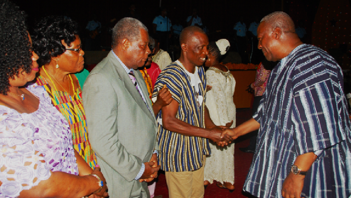 • President Mahama exchanging greetings with some oldies during the luncheon at the State House in Accra. Pictures: EBOW HANSON Senior citizens honoured in different parts of country