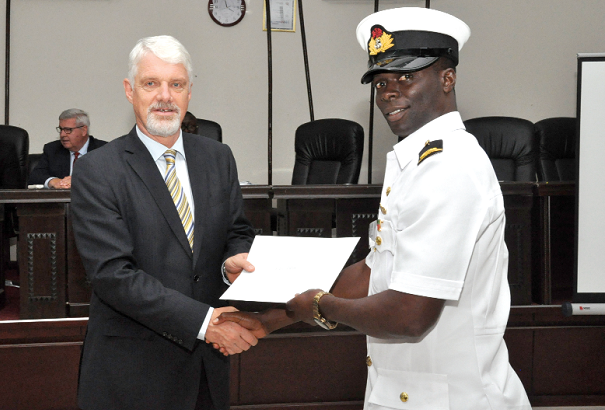 Mr Hanna handing over a certificate to one of the participants Mr Hanna handing over a certificate to one of the participants