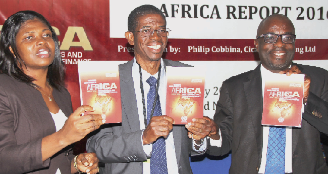 Mr Philip A. Cobbina (right), Mr Augustine A. Otoo (2nd left), Director Research & Business Development, Ghana Investment Promotion Centre (GIPC) and Mrs Cynthia Prah (left), launching the Economic Development in Africa Report 2016 at the ceremony. Picture: GLADYS ATTA BOATENG Don’t borrow to finance SDGs : UNCTAD cautions African countries