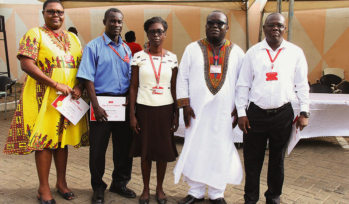 Mr Kenneth Ashigbey (2nd right)  with some members of staff who were recognised for their long service. Pictures: Gladys Atta Boateng