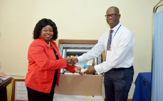 Dr Wiafe Addai (left) exchaning greetings with Mr Paul Obeng after presenting the items Komfo Anokye, Korle Bu hospitals receive chemotherapy drugs