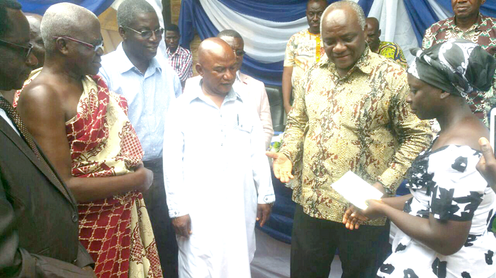 Mr Addai Nimo (2nd right) after he had presented the cheque to Madam Lydia Adu-Botchey (right) Mr Addai Nimo (2nd right) after he had presented the cheque to Madam Lydia Adu-Botchey (right)
