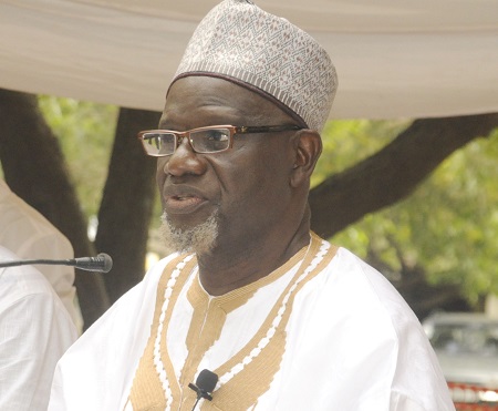 Alhaji Maulvi Mohammed Bin Salih, Ameer (Head) and Missionary in charge of Ahmadiyya Muslim Mission leading a prayer session on the occasion of Eid-ul-Fitr celebration at Ashongman in Accra.