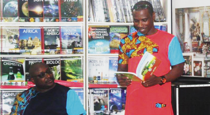 Book lovers listened attentively to writers, Nana Damoah (seated) and Kofi Akpabli Damoah, Akpabli hold reading session