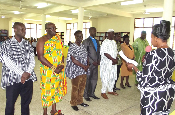 Mrs Owusu Achiaw swearing in the new board members of KOSS