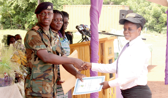 Lt. Col Franklin Gyamera-Amoako (left), Chief Instructor, Young Women in Professional Driving, presenting a certificate to Ms Alhassan Nafisa, a beneficiary of the programme. Picture: NII MARTEY M. BOTCHWAY Lt. Col Franklin Gyamera-Amoako (left), Chief Instructor, Young Women in Professional Driving, presenting a certificate to Ms Alhassan Nafisa, a beneficiary of the programme. Picture: NII MARTEY M. BOTCHWAY