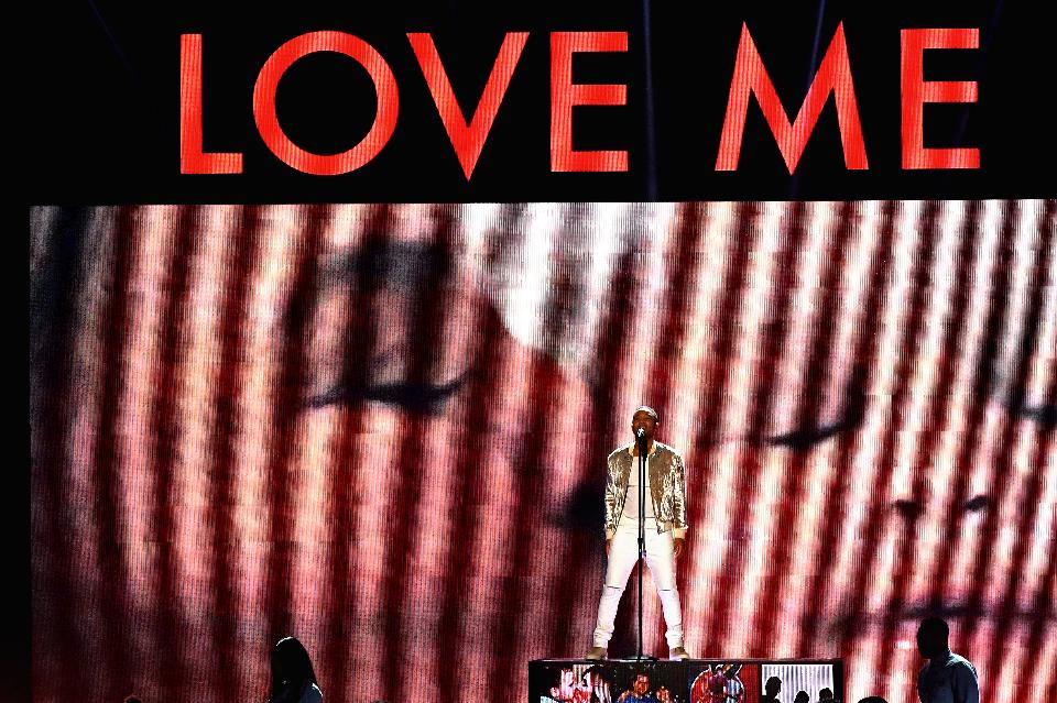Singer John Legend performs onstage during the 2016 American Music Awards at Microsoft Theater