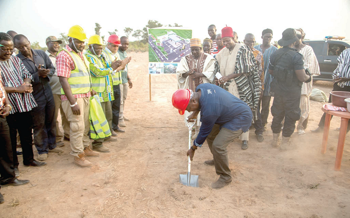 The President cutting the sod for the construction of the farmers centre The President cutting the sod for the construction of the farmers centre