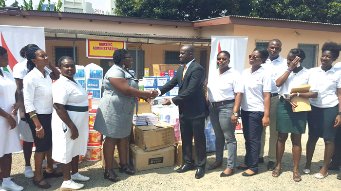 Mr Brentwood Nartey (right), presenting the items to Dr Pinaman Appau (left) Mr Brentwood Nartey (right), presenting the items to Dr Pinaman Appau (left)