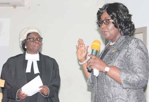 Rev. Mrs Patricia Sappor (right), being sworn in as the President of the Chartered Institute of Bankers (CIB) Ghana, by Mrs Justice Georgina Mensah-Datsa (left), High Court judge Rev. Mrs Patricia Sappor (right), being sworn in as the President of the Chartered Institute of Bankers (CIB) Ghana, by Mrs Justice Georgina Mensah-Datsa (left), High Court judge