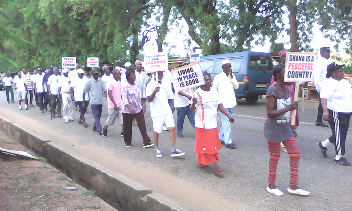 Members of the Legends Club marching through the streets of Wa Members of the Legends Club marching through the streets of Wa