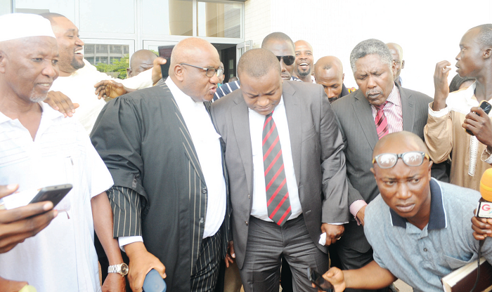 Lawyer Maxwell Kombla Logan (2nd left), Counsel for APC, interacting with Mr Hassan Ayariga (3rd left), Presidential Candidate, APC, and Mr Emmanuel Karl Bartels (2nd right), Vice Presidential Candidate, APC, after the court hearing. Picture: EMMANUEL ASAMOAH ADDAI Lawyer Maxwell Kombla Logan (2nd left), Counsel for APC, interacting with Mr Hassan Ayariga (3rd left), Presidential Candidate, APC, and Mr Emmanuel Karl Bartels (2nd right), Vice Presidential Candidate, APC, after the court hearing. Picture: EMMANUEL ASAMOAH ADDAI