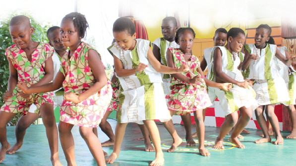 Members of the Oasis Montessori dance club in a cultural display