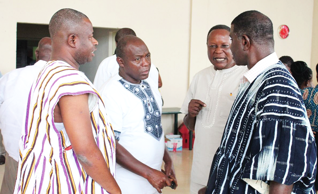 Some of the participants interacting with one another after the conference