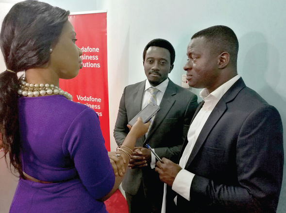 Mr Yaw Asamoah and Mr Caleb Ayiku (middle) interacting with Vivian Kai Lokko, a journalist Mr Yaw Asamoah and Mr Caleb Ayiku (middle) interacting with Vivian Kai Lokko, a journalist