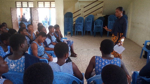 The Creative Director of The Lotus Events, Elizabeth Victoria Amanor addressing the students