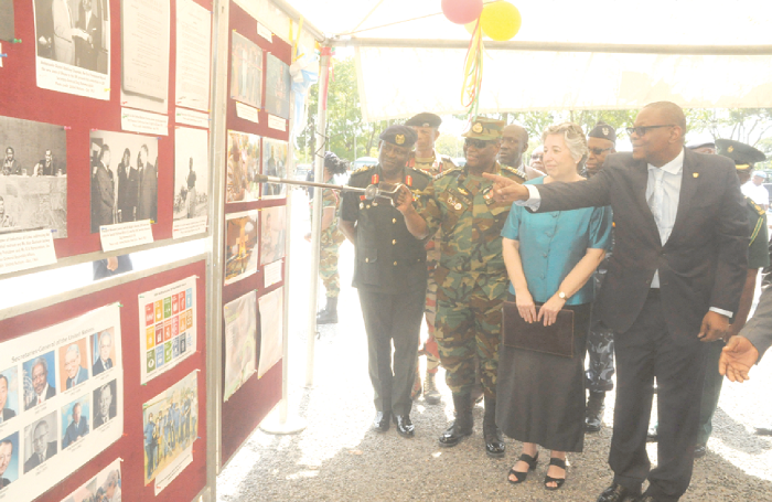 Mr Emmanuel Bombande (right), the Deputy Minister of Foreign Affairs, and Air Marshal Michael Samson-Oje (2nd left), the Chief of the Defence Staff, at an exhibition mounted at the State House to mark the UN Day celebration in Accra. Looking on are Ms Christine Evans Klock (2nd right), UN Resident Coordinator in Accra, and other officials. Picture: GABRIEL AHIABOR Mr Emmanuel Bombande (right), the Deputy Minister of Foreign Affairs, and Air Marshal Michael Samson-Oje (2nd left), the Chief of the Defence Staff, at an exhibition mounted at the State House to mark the UN Day celebration in Accra. Looking on are Ms Christine Evans Klock (2nd right), UN Resident Coordinator in Accra, and other officials. Picture: GABRIEL AHIABOR