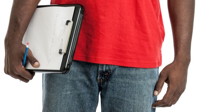 Clipboards are used as a flat base to write on as desks are often uneven
